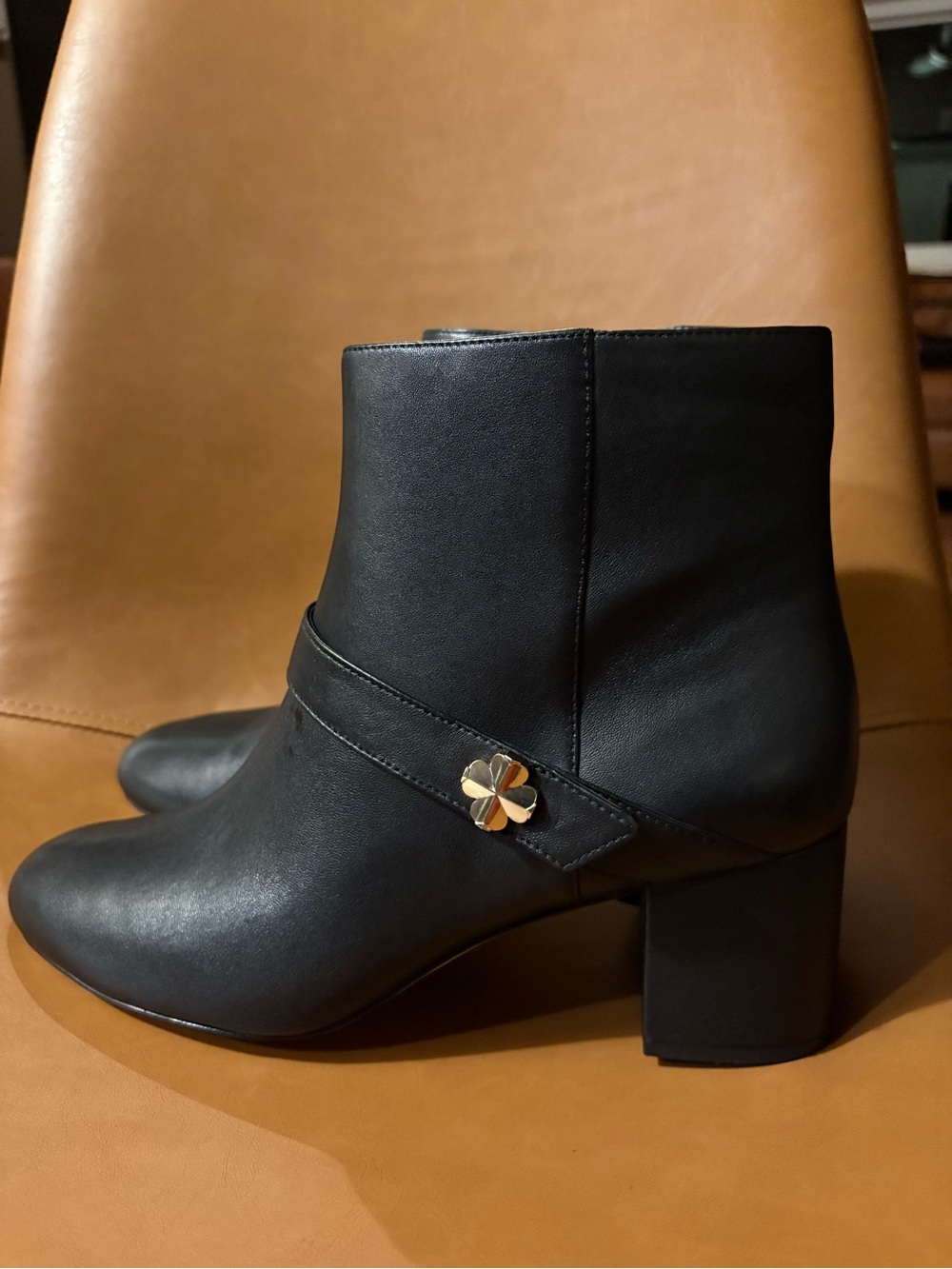 kate spade Black Leather Ankle Booties with Gold Clover Detail